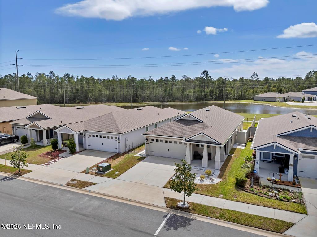 86178 Mainline Road Yulee, FL 32097 - Photo 9 of 61 a view of a house with outdoor space and sitting area