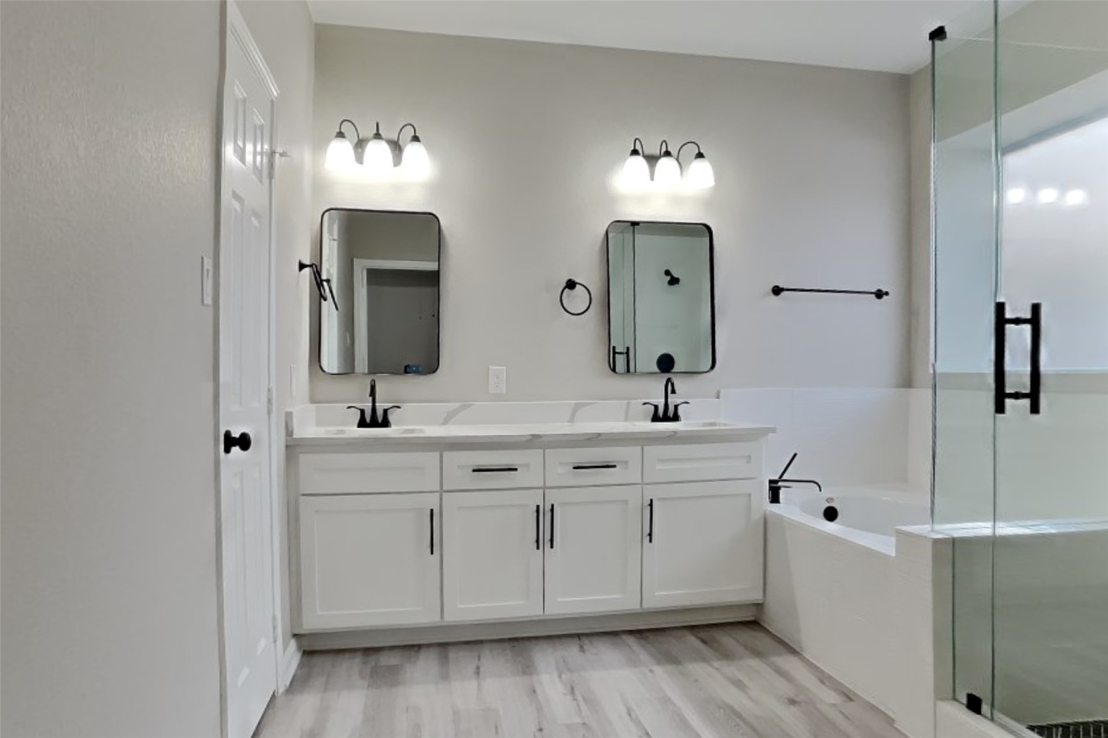 2014 Ridgeway Park Drive Houston, TX 77339 - Photo 12 of 19 a spacious bathroom with a double vanity sink mirror and