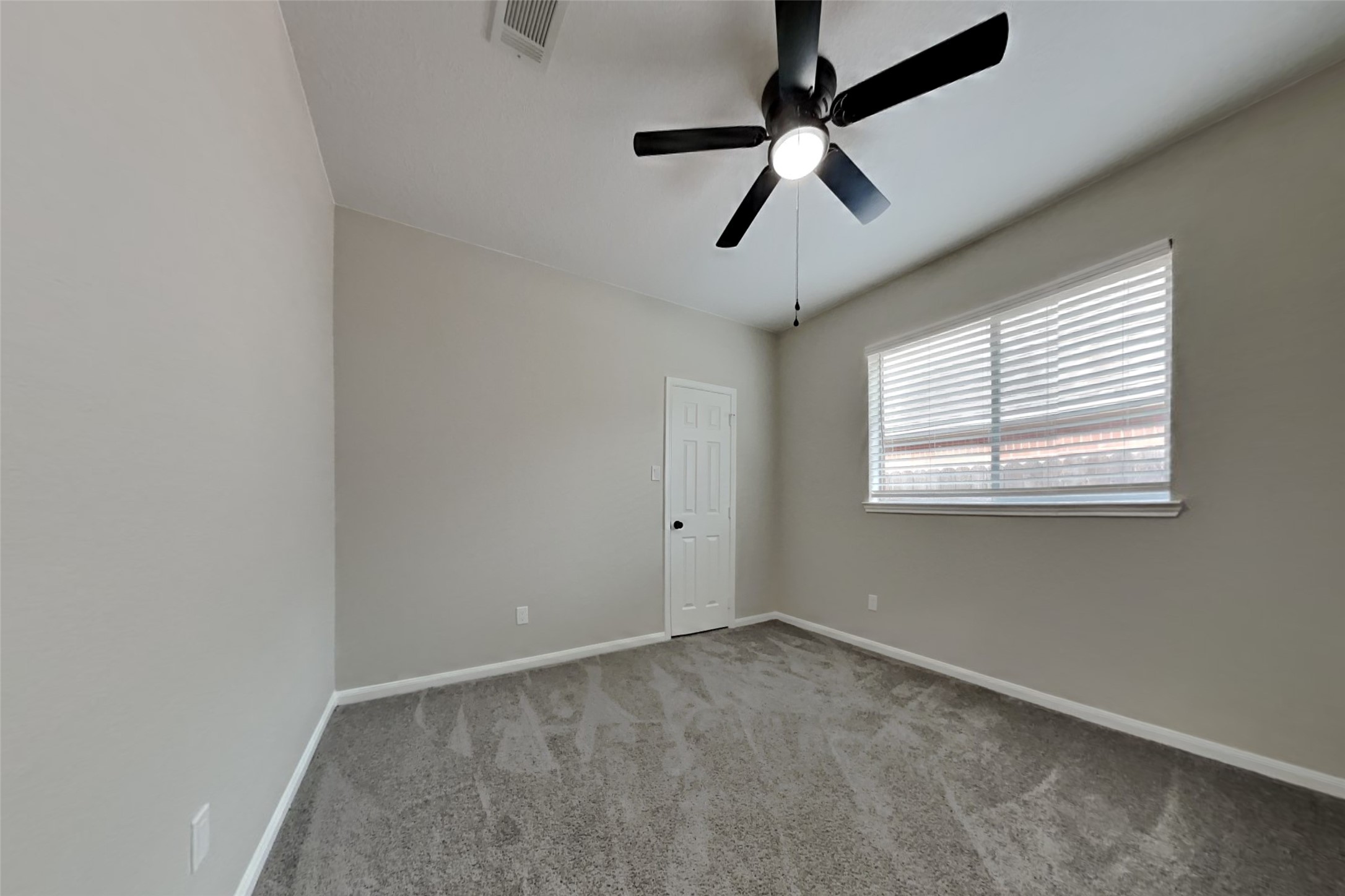 2014 Ridgeway Park Drive Houston, TX 77339 - Photo 14 of 19 a view of room with ceiling fan and windows