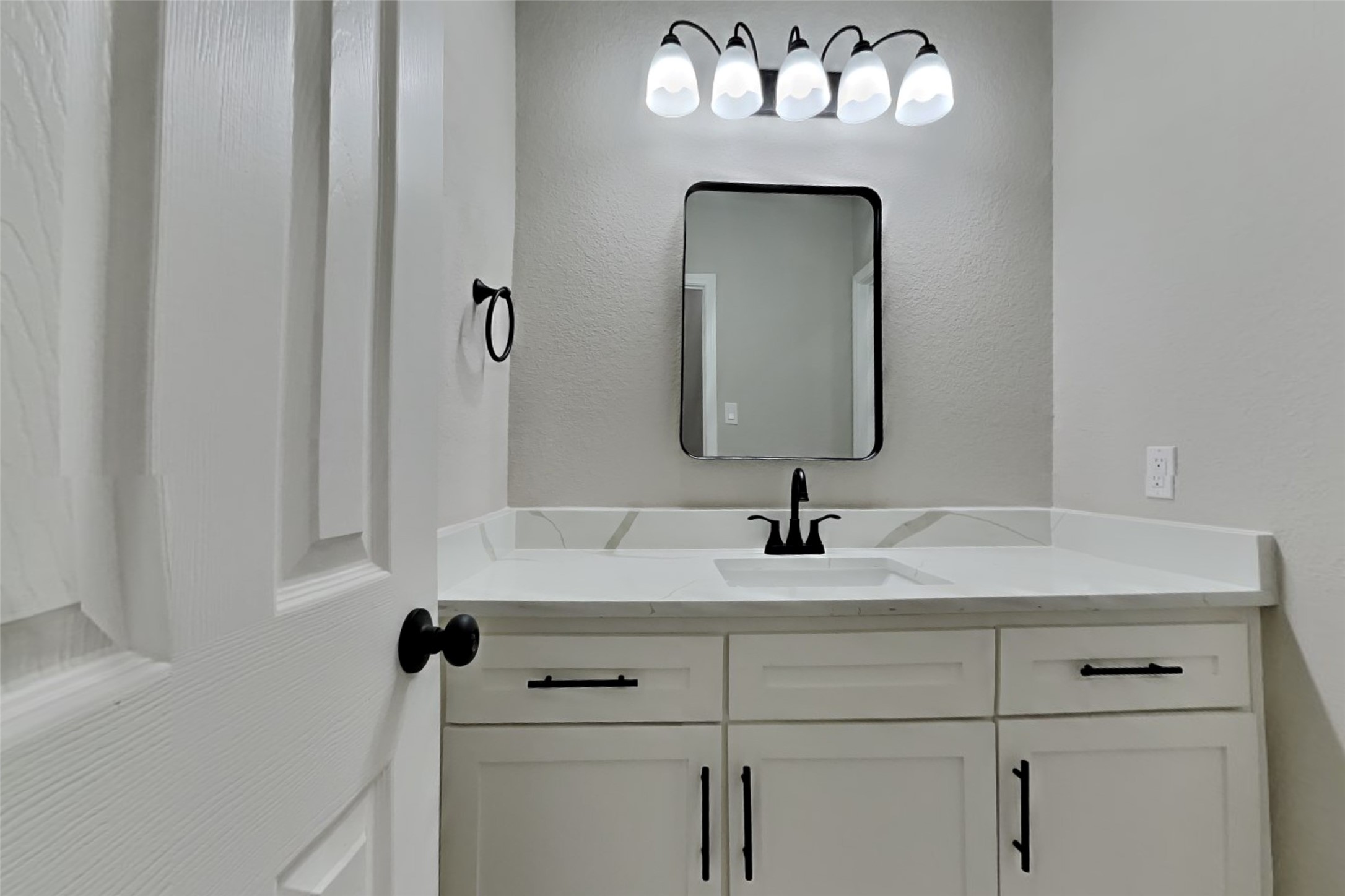 2014 Ridgeway Park Drive Houston, TX 77339 - Photo 16 of 19 a bathroom with a sink and a mirror