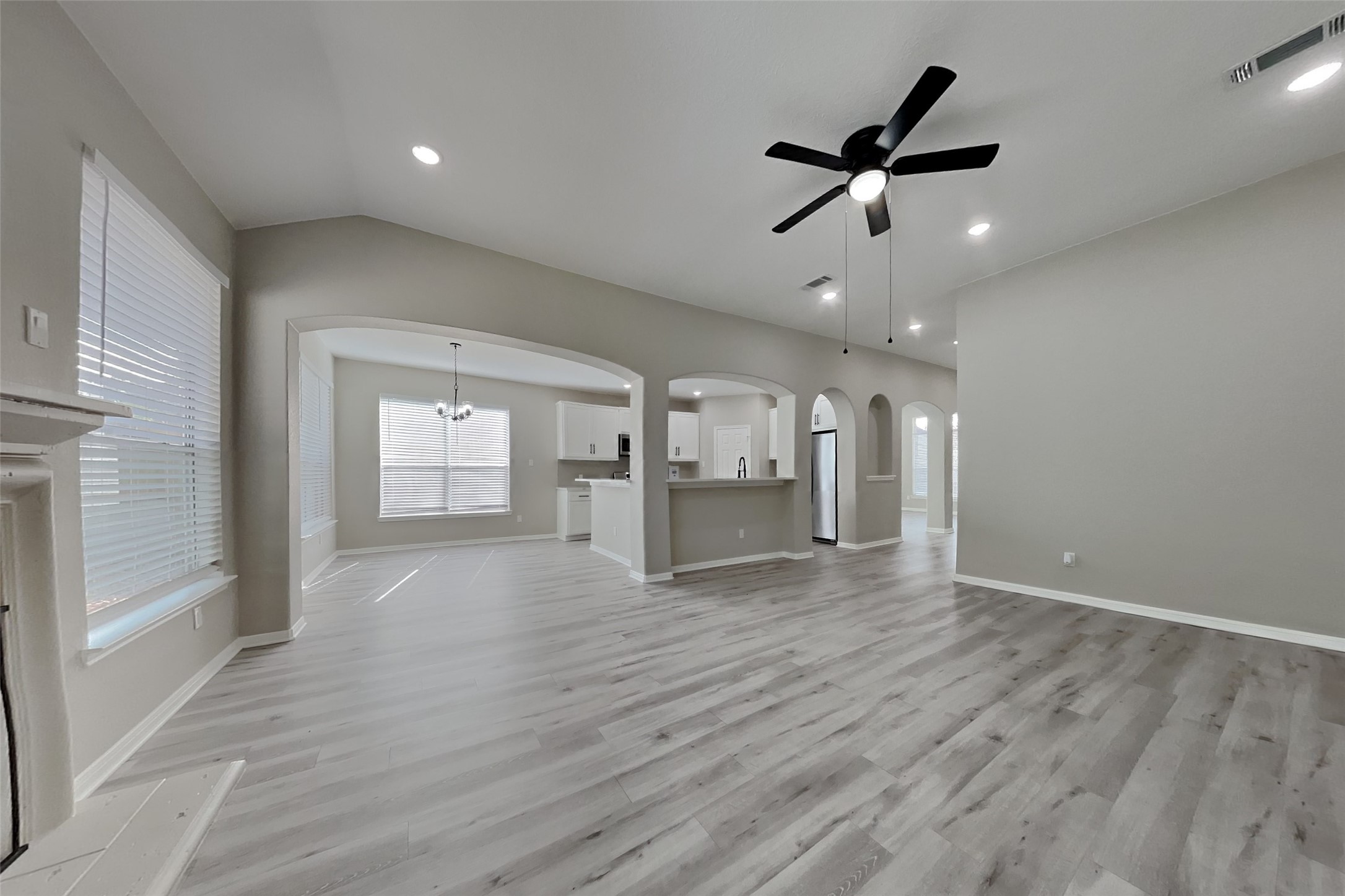 2014 Ridgeway Park Drive Houston, TX 77339 - Photo 2 of 19 a view of empty room with wooden floor and ceiling fan