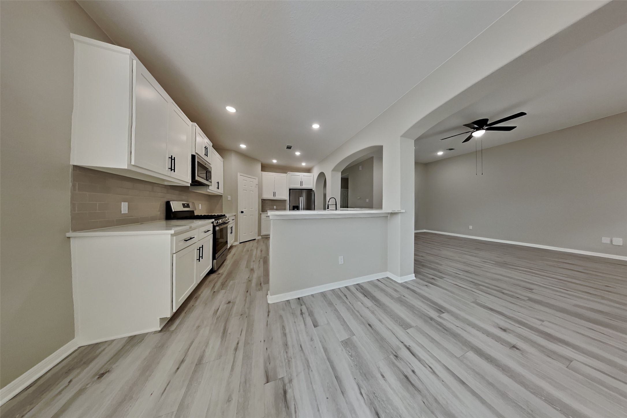 2014 Ridgeway Park Drive Houston, TX 77339 - Photo 6 of 19 a view of a kitchen with microwave and cabinets