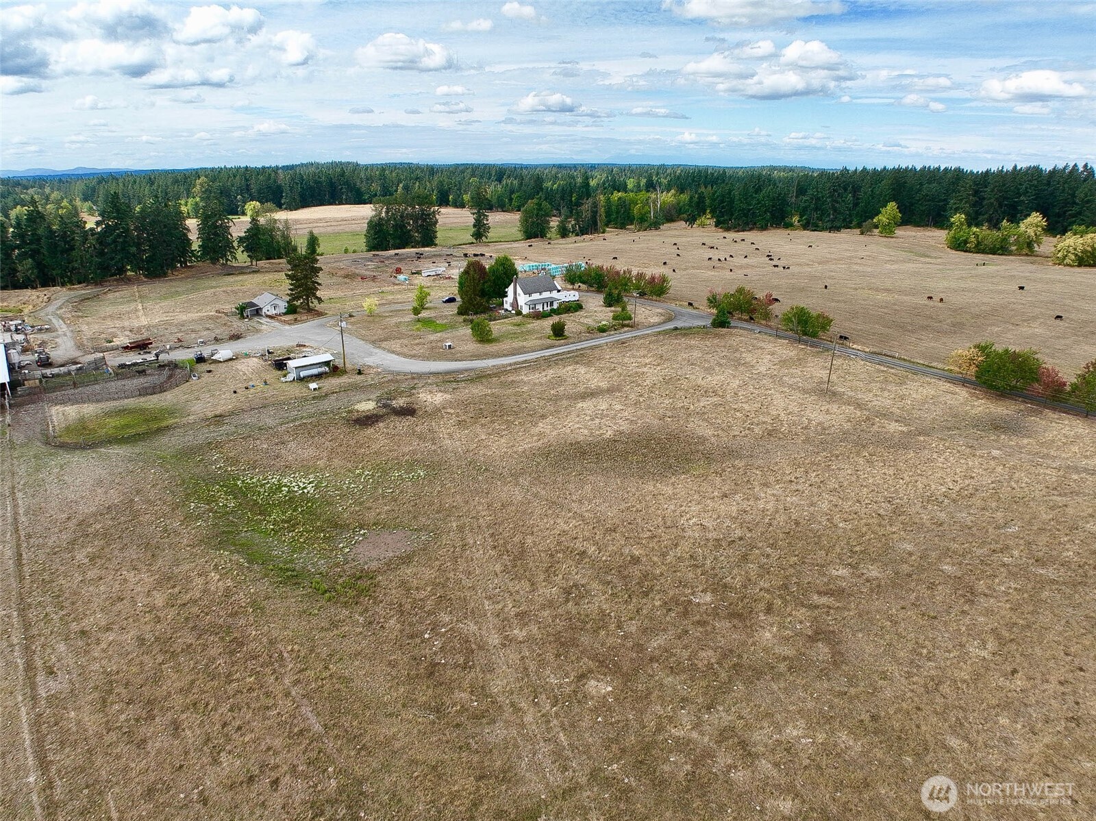 32002 48th Avenue South Roy, WA 98580 - Photo 28 of 40 a view of a lake with houses