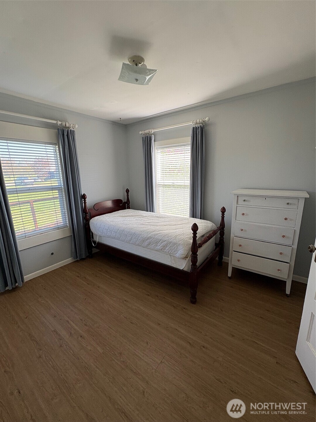 32002 48th Avenue South Roy, WA 98580 - Photo 38 of 40 a bedroom with a bed and a window