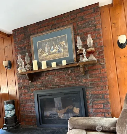 a view of house with backyard and porch