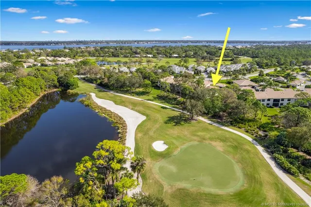 a view of a swimming pool with a lake view