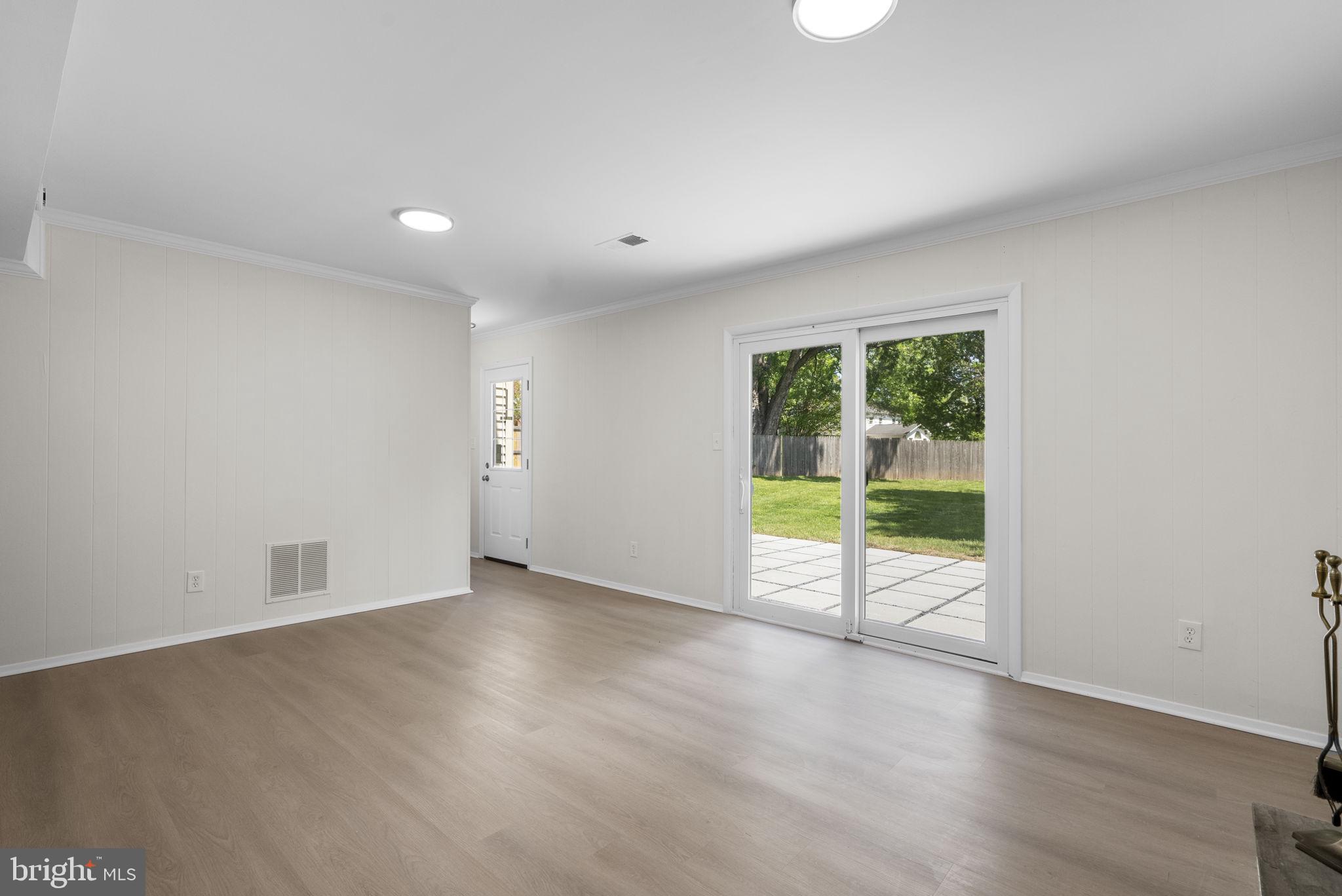17109 Oxley Farm Road Poolesville, MD 20837 - Photo 30 of 43 Rec room/family room walks out to patio