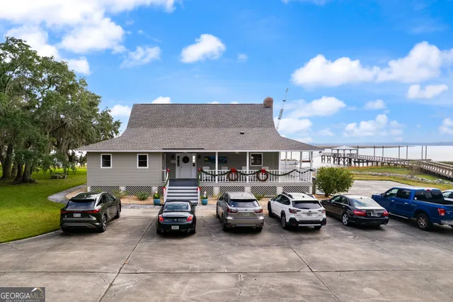 a view of a car parked in front of a house