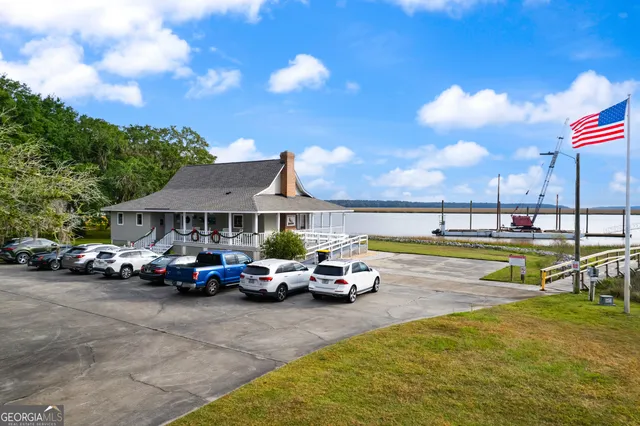 a swimming pool view with a outdoor seating