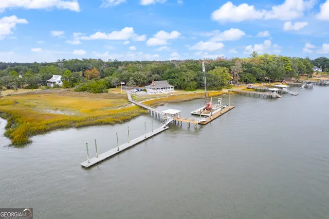 a view of swimming pool with outdoor seating and city view