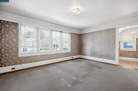 an empty room with windows