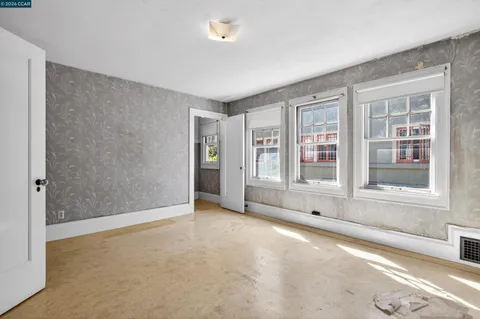 an empty room with windows