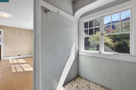 a view of a two chairs in the house