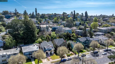 an aerial view of multiple house with yard