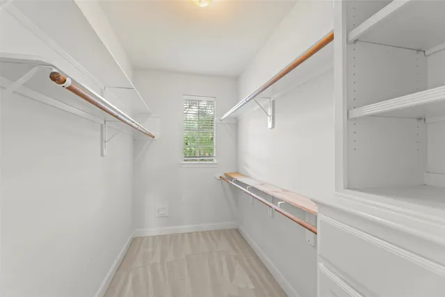 a view of an empty walk in closet