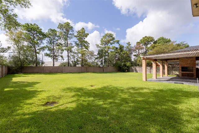 front view of a house with a big yard