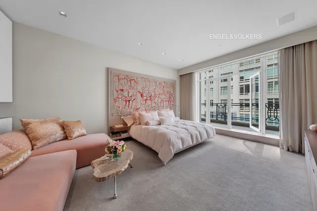 a kitchen with a stove a refrigerator and a sink