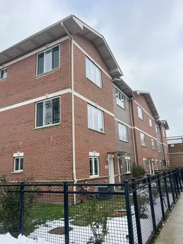 a front view of a building with balcony