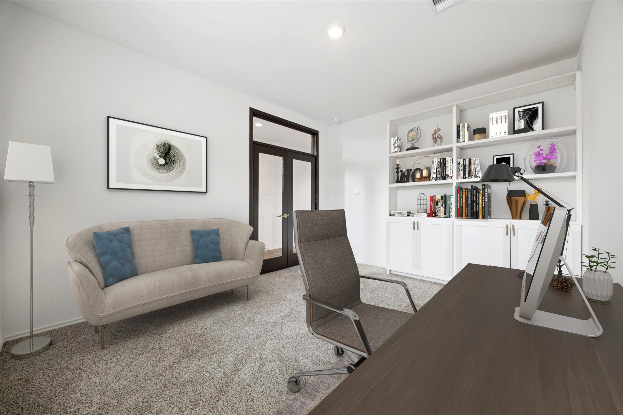 a work room with furniture and a book shelf