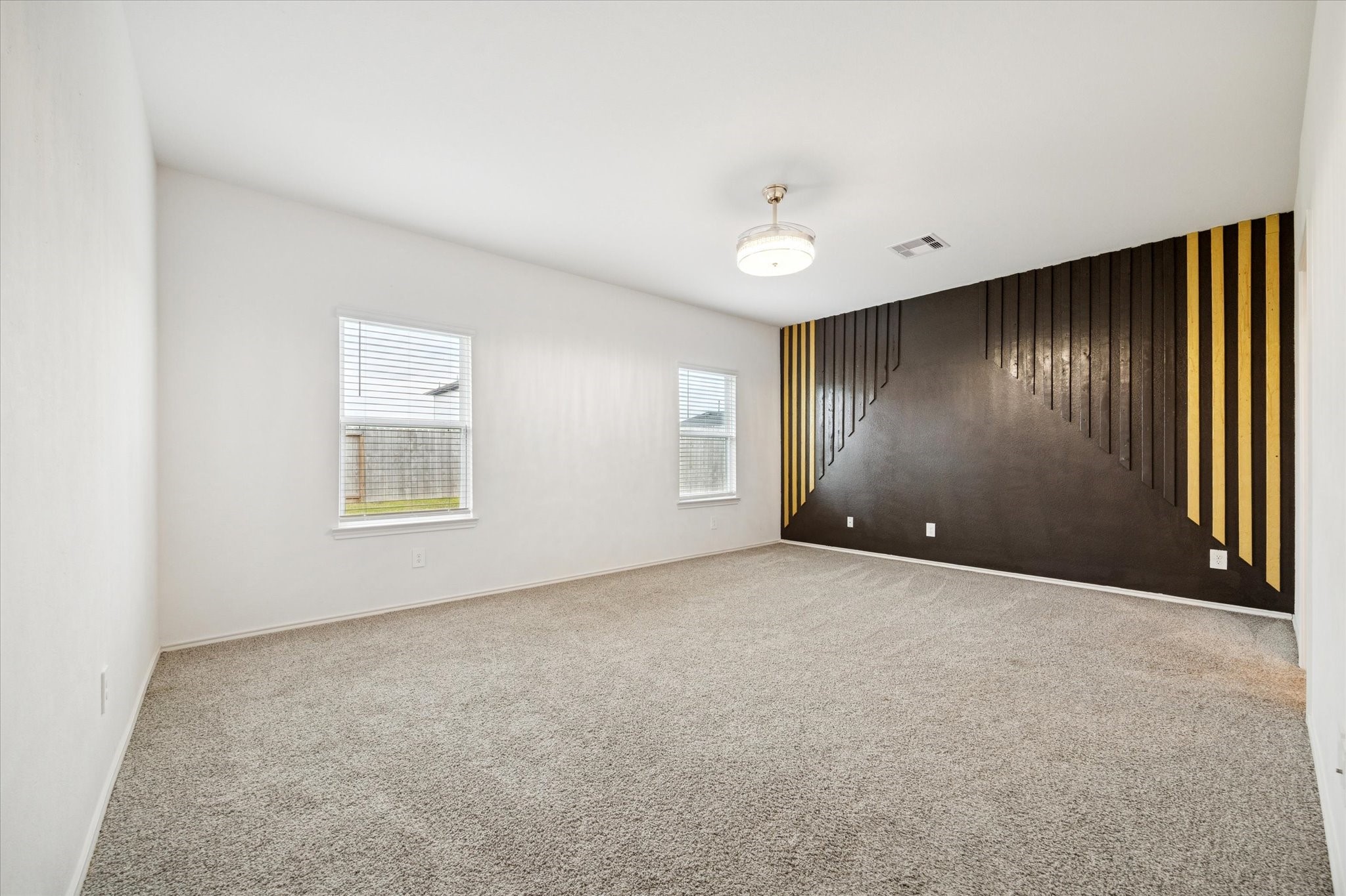 2938 Bur Landing Lane Rosenberg, TX 77469 - Photo 12 of 21 an empty room with windows and closet