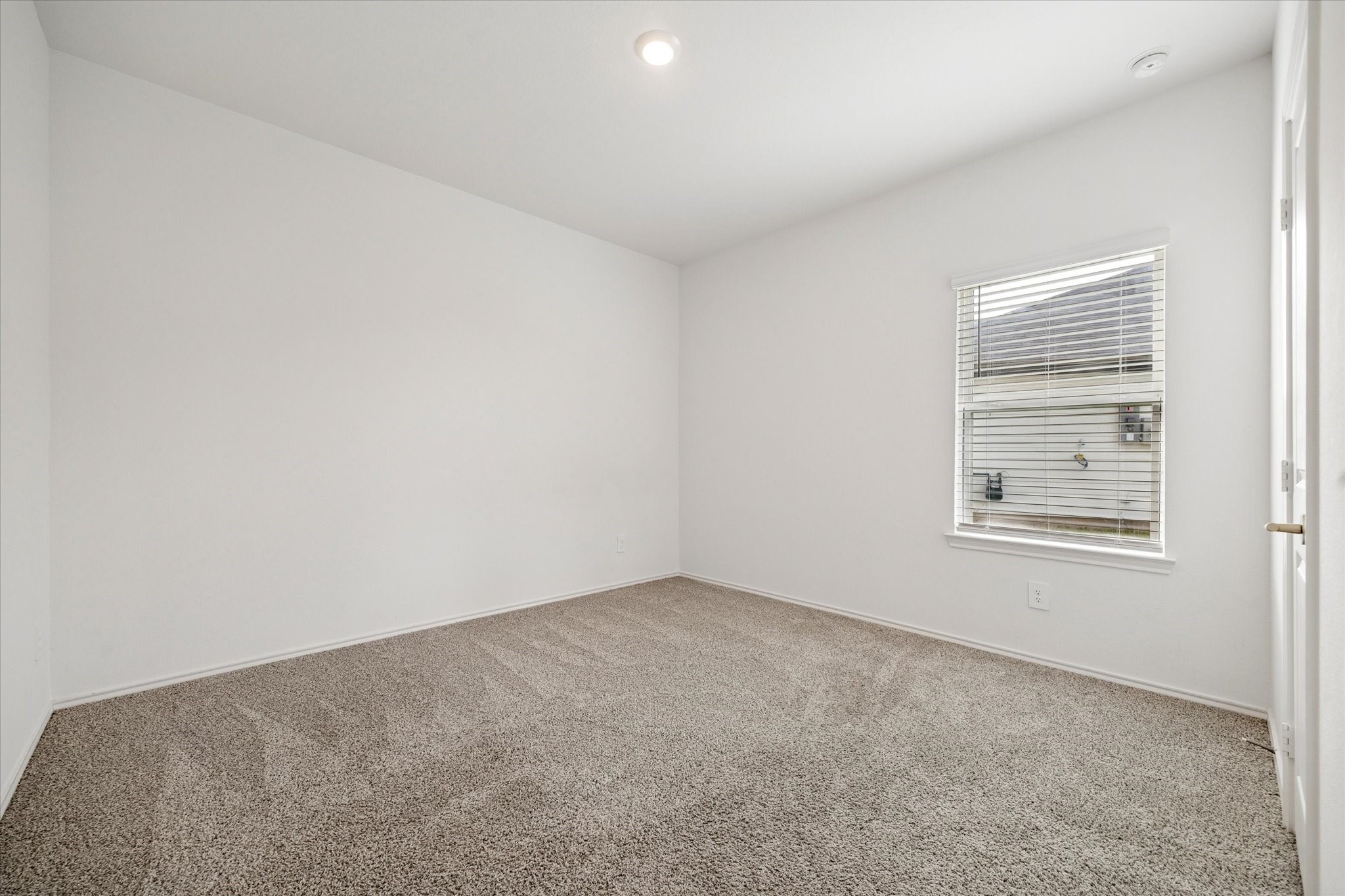 2938 Bur Landing Lane Rosenberg, TX 77469 - Photo 14 of 21 an empty room with a window