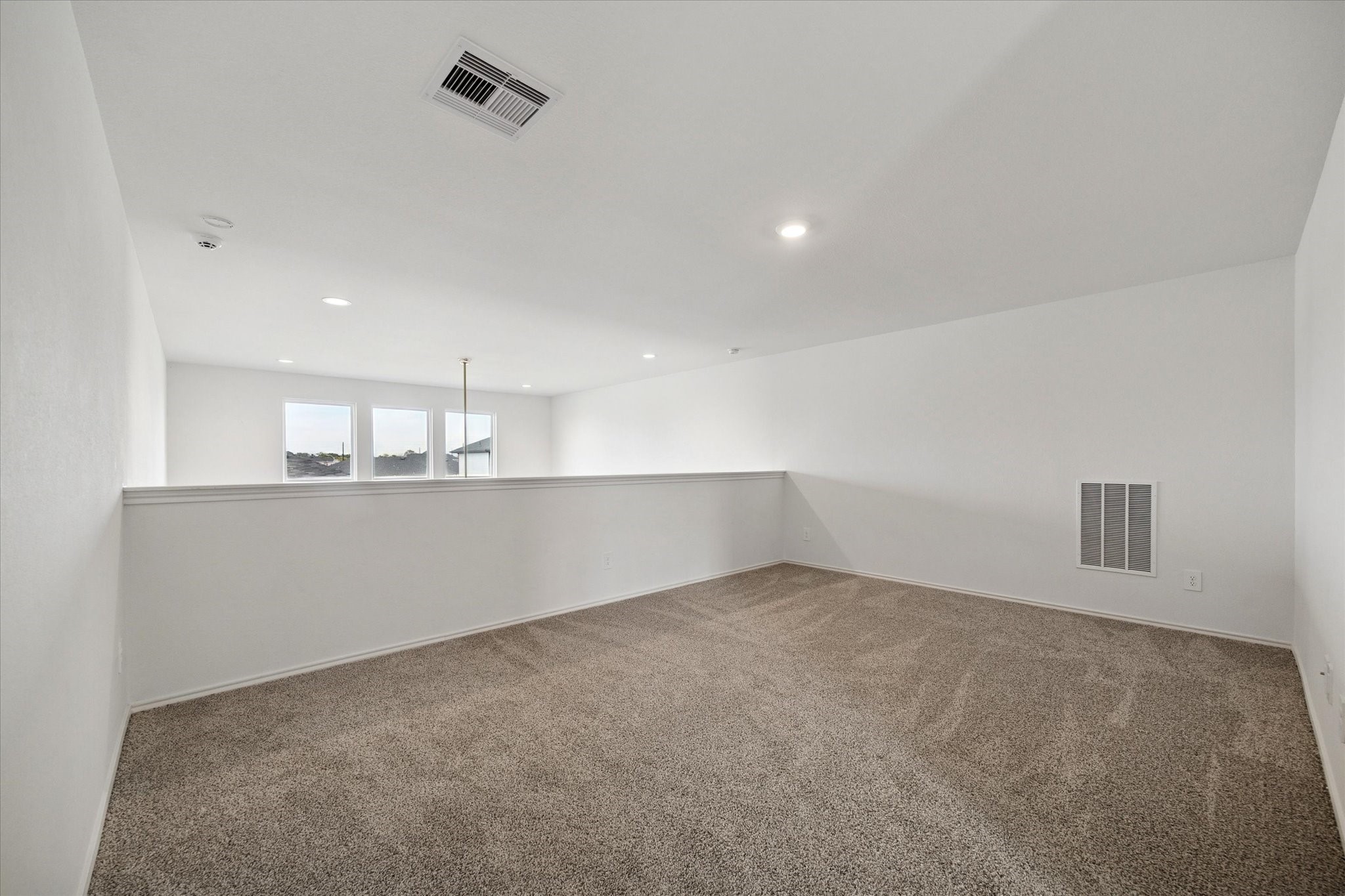 2938 Bur Landing Lane Rosenberg, TX 77469 - Photo 20 of 21 an empty room with kitchen view and a window