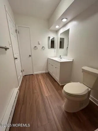 a bathroom with a sink and mirror