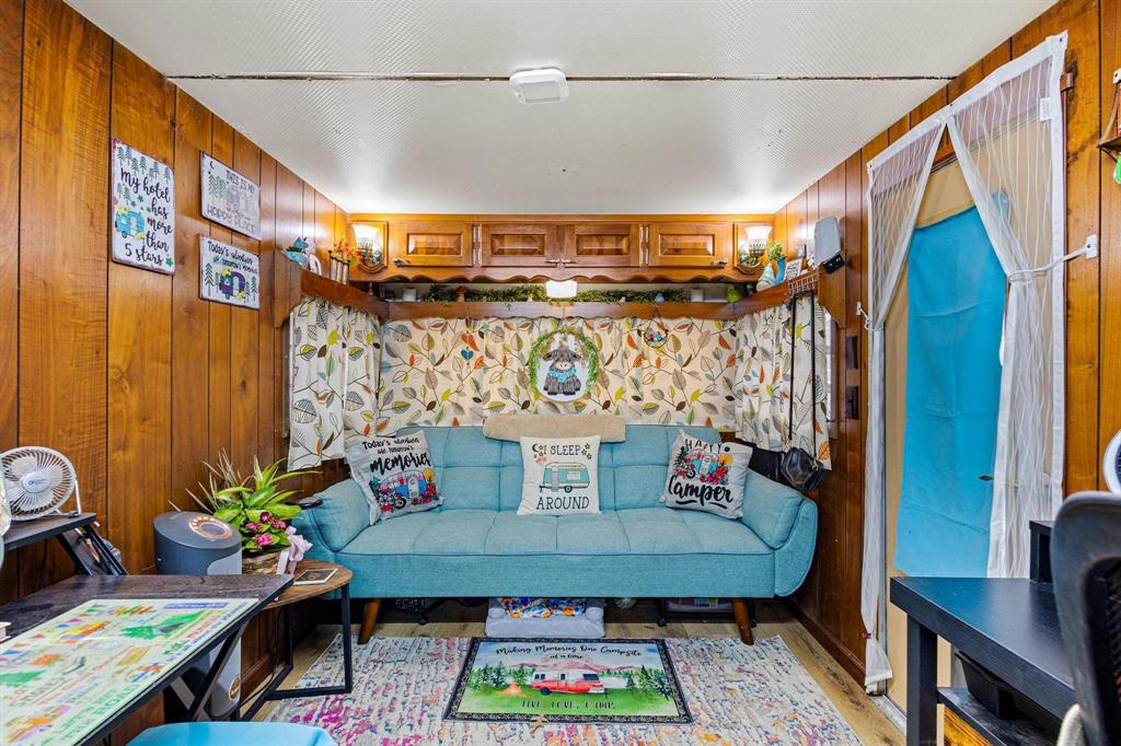 988 County Road Gordonville, TX 76245 - Photo 24 of 35 a view of a room with furniture and wooden floor