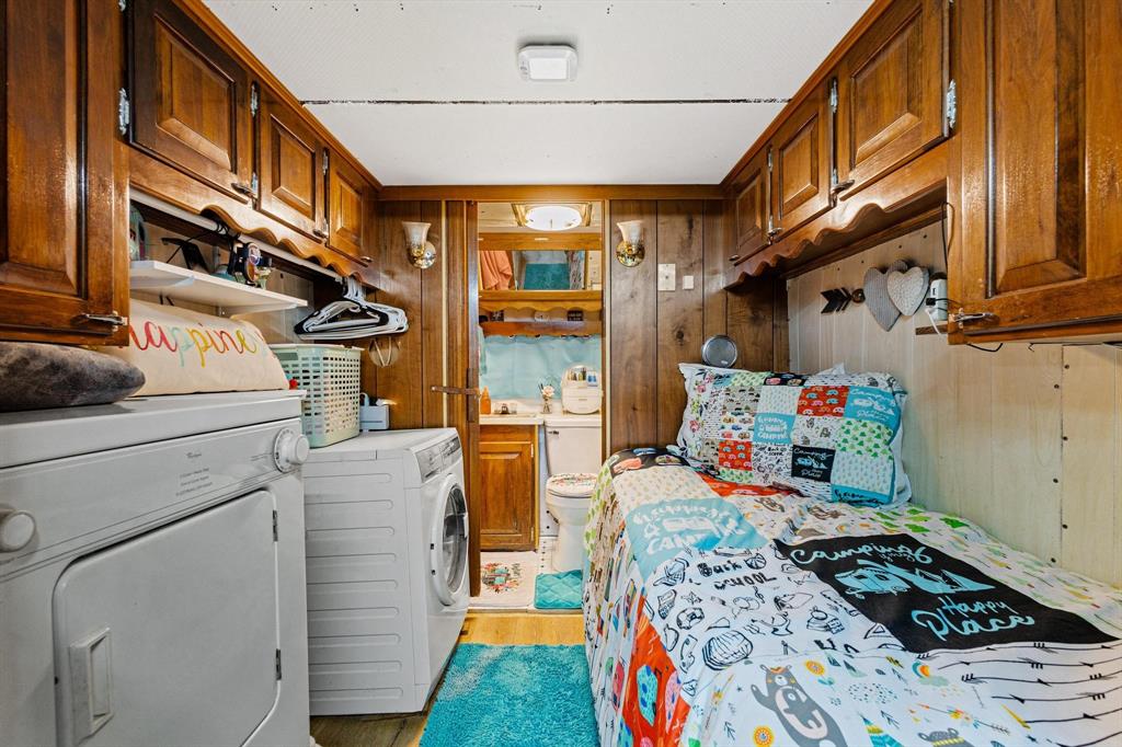 988 County Road Gordonville, TX 76245 - Photo 26 of 35 a utility room with dryer and washer