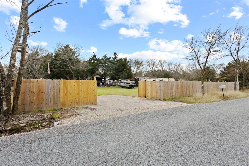 988 County Road Gordonville, TX 76245 - Photo 30 of 35 a view of a house with a yard