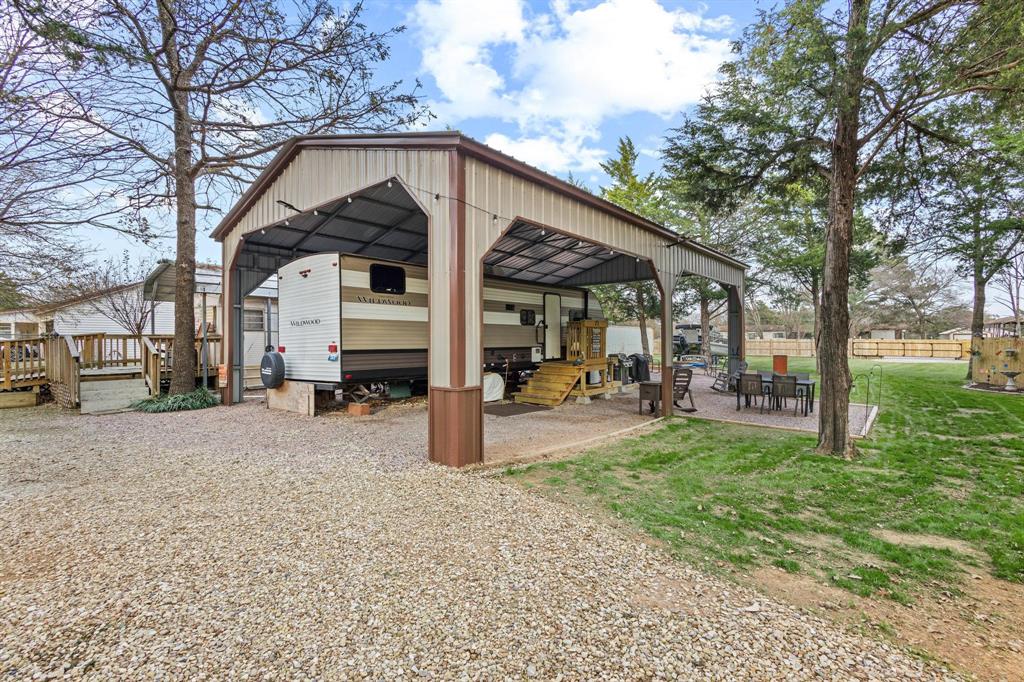 988 County Road Gordonville, TX 76245 - Photo 10 of 35 a view of a house with a yard