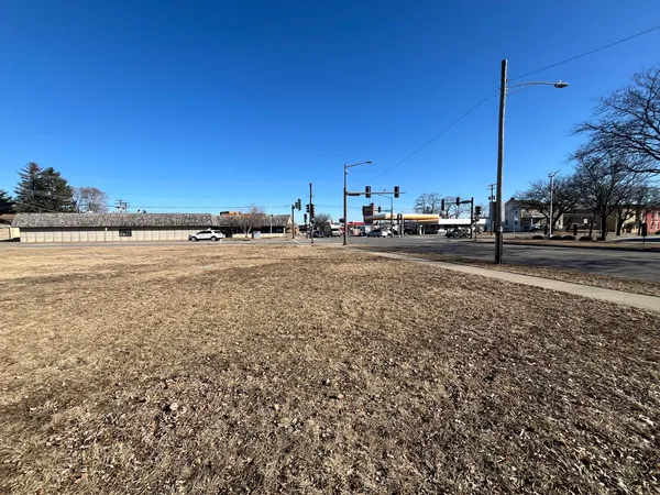 a view of a road with an ocean view