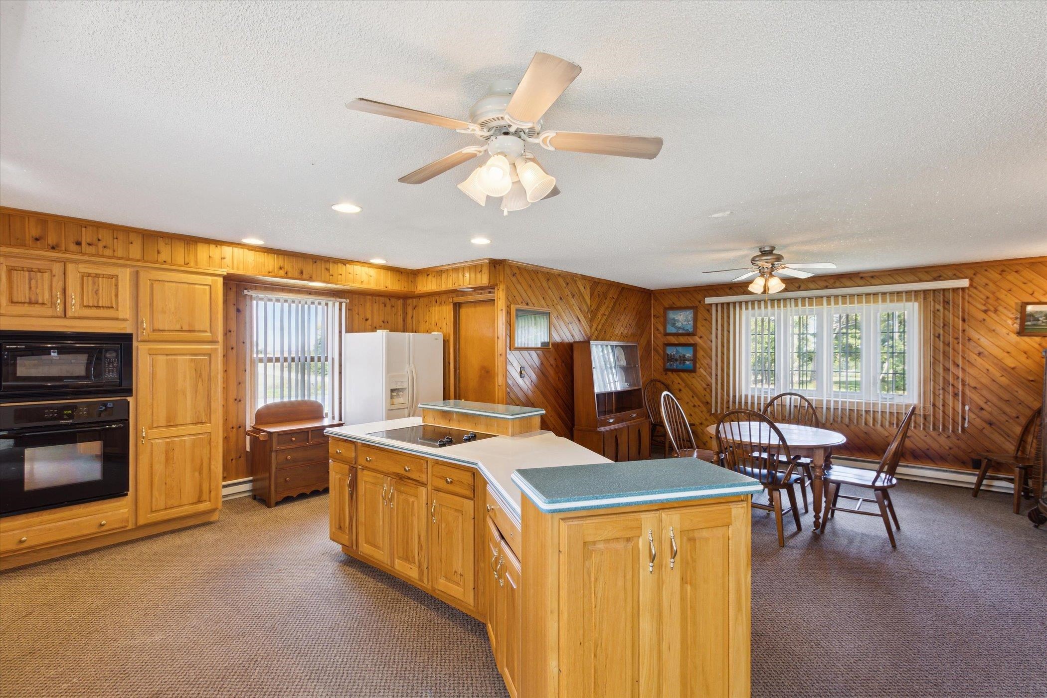4994 North Unity Road Lena, IL 61048 - Photo 14 of 50 a view of a dining room with furniture window and outside view