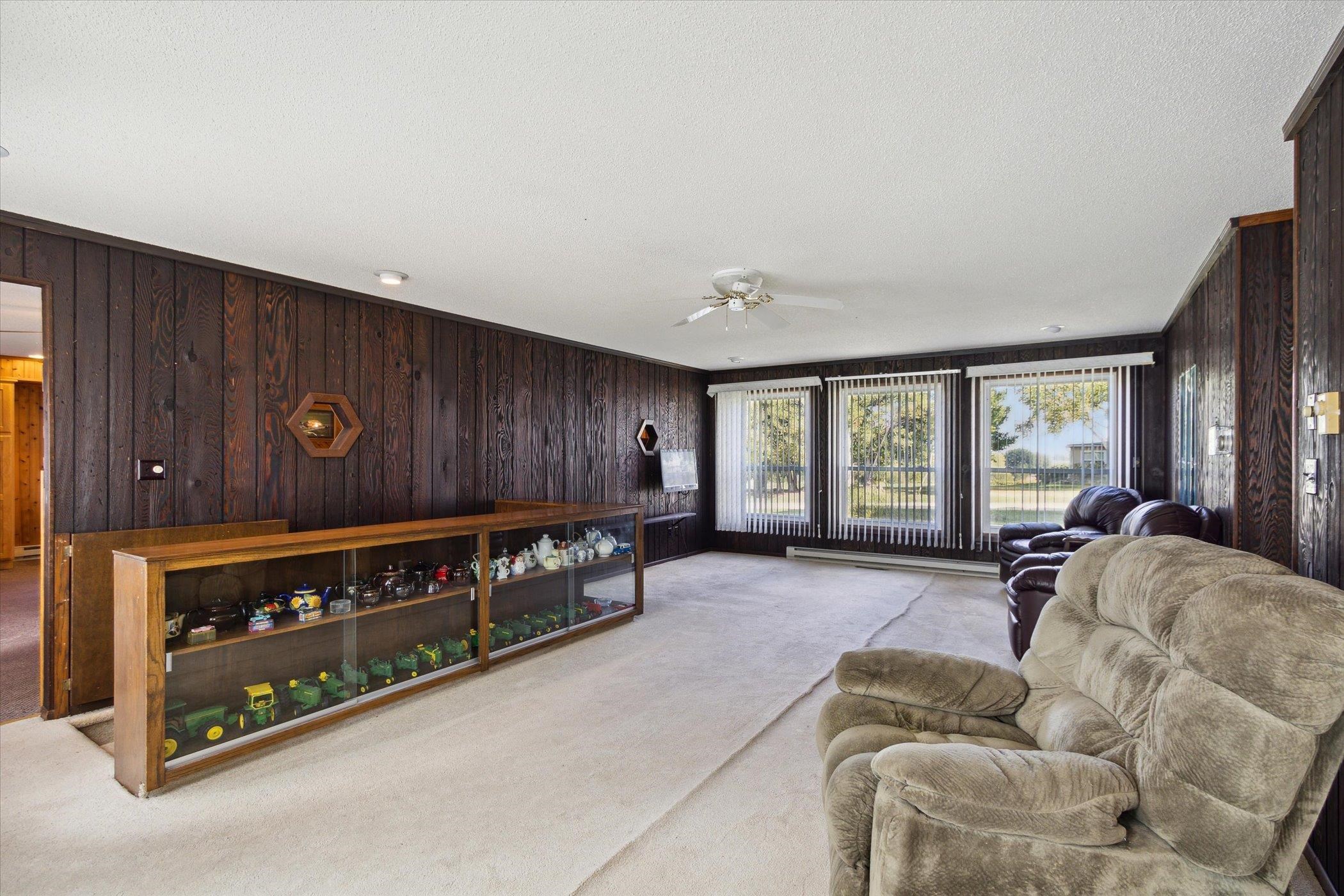 4994 North Unity Road Lena, IL 61048 - Photo 19 of 50 a living room with furniture and windows