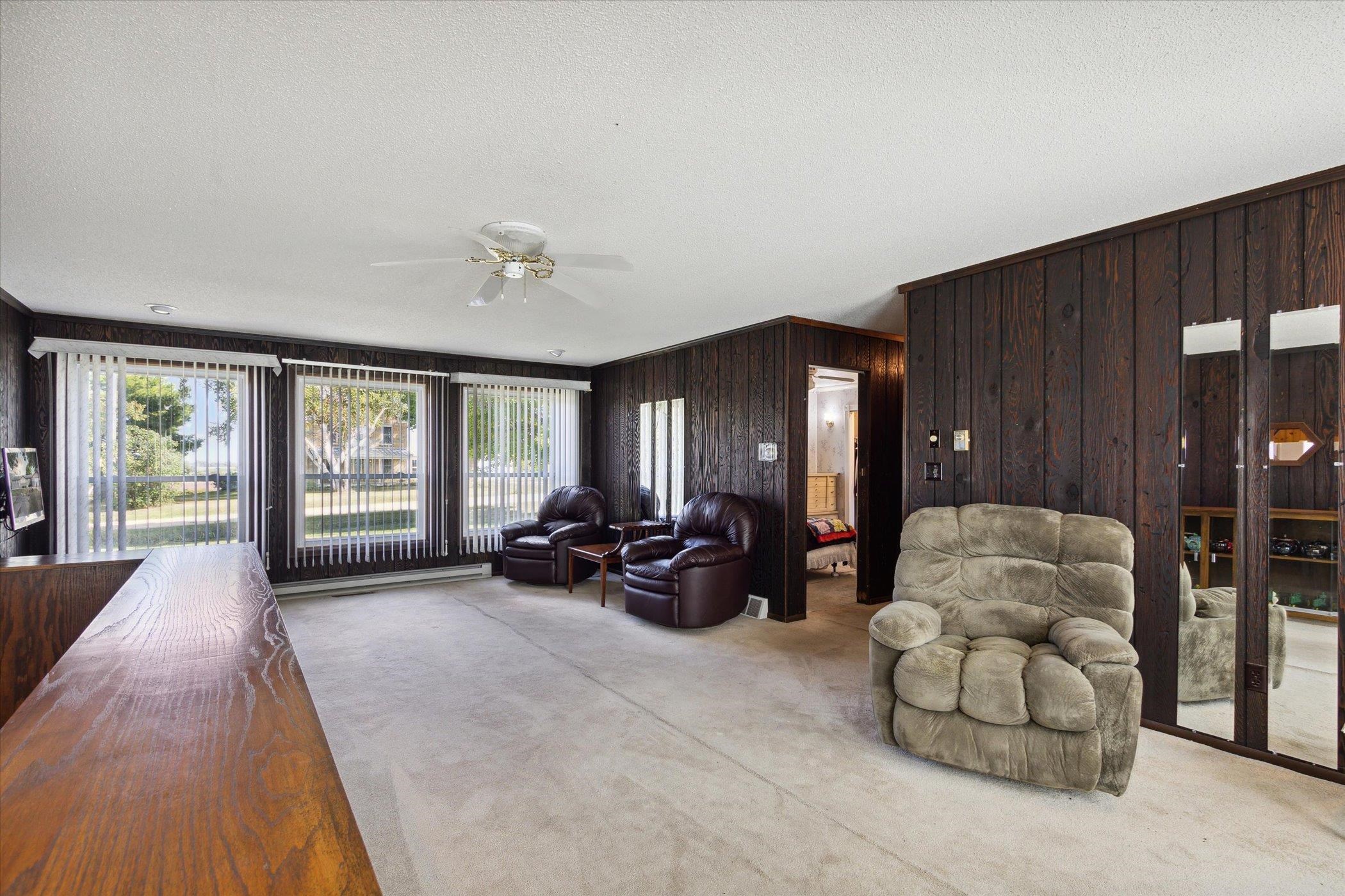 4994 North Unity Road Lena, IL 61048 - Photo 20 of 50 a living room with furniture and large windows
