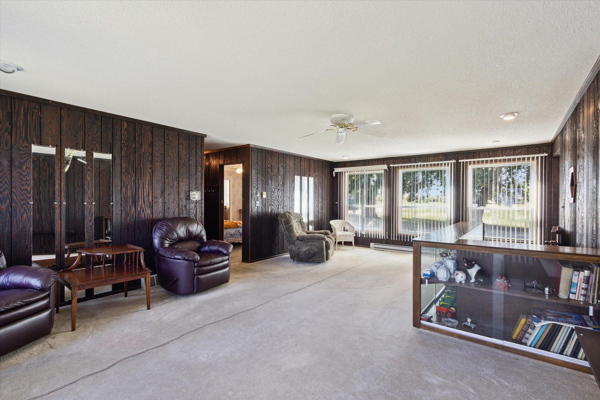 4994 North Unity Road Lena, IL 61048 - Photo 21 of 50 a living room with furniture and a window