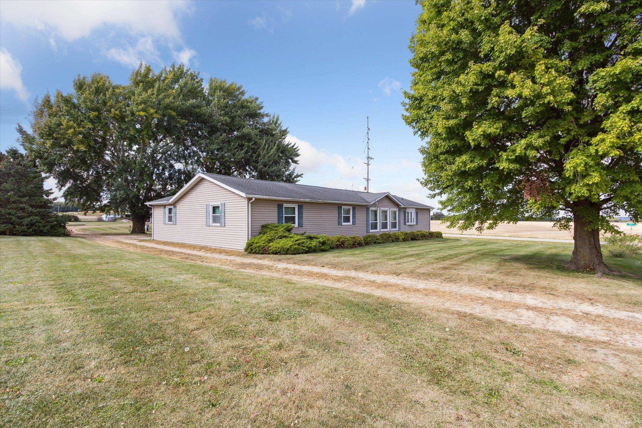 4994 North Unity Road Lena, IL 61048 - Photo 32 of 50 a front view of house with yard and trees