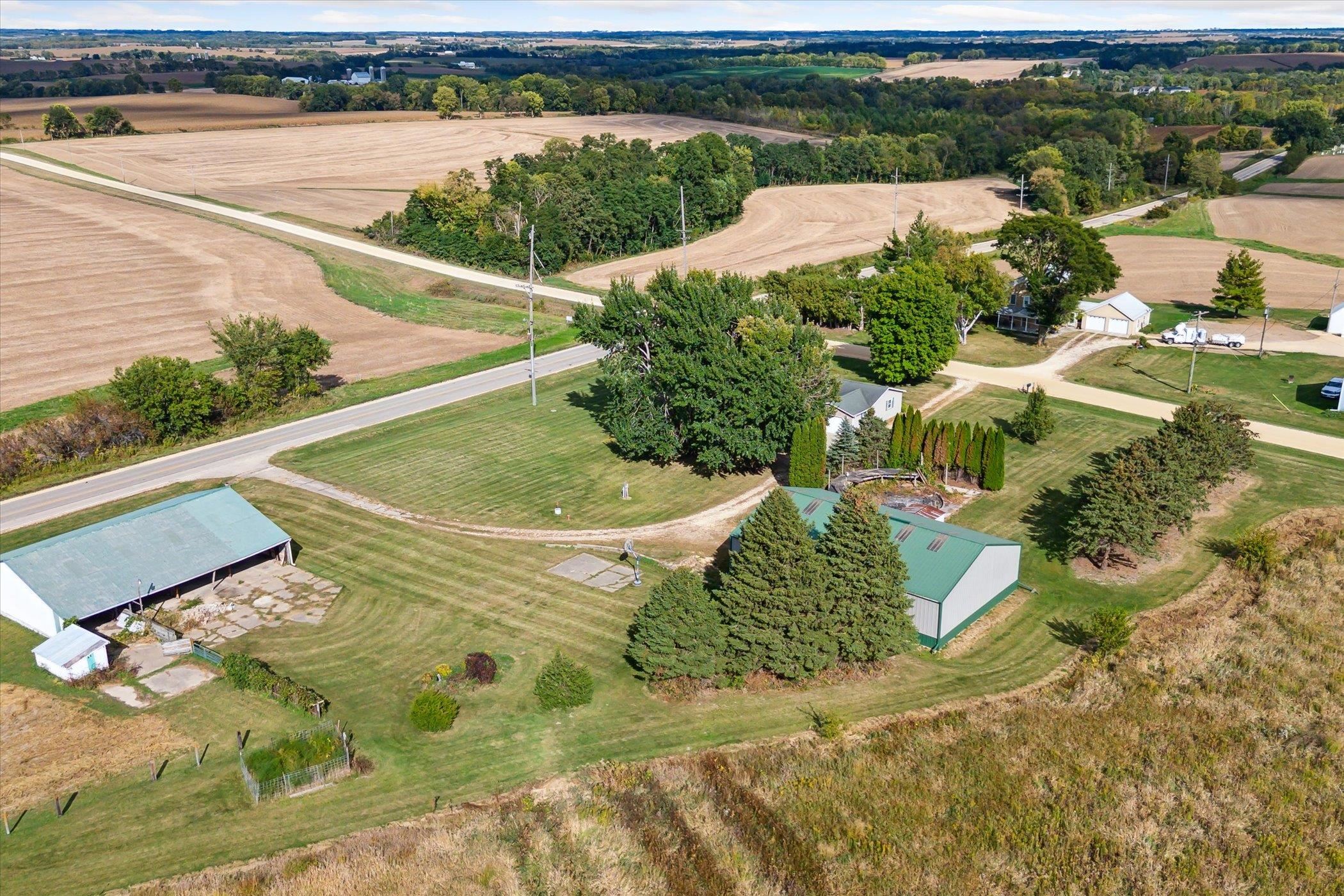 4994 North Unity Road Lena, IL 61048 - Photo 47 of 50 an aerial view of a house with a yard and lake view