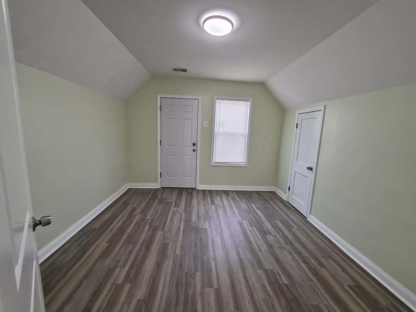 1234 West 72nd Street Chicago, IL 60636 - Photo 13 of 35 wooden floor in an empty room with a window