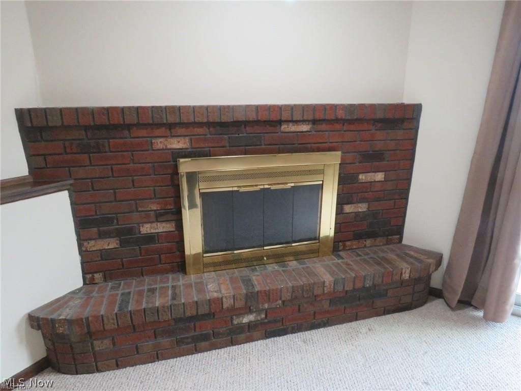 36896 Chestnut Ridge Road North Ridgeville, OH 44039 - Photo 17 of 32 wood burning fireplace.