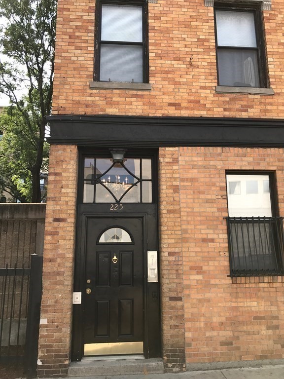 225-227 East Berkeley Street, Unit 4 Boston, MA 02118 - Photo 10 of 10 a view of brick building with a door