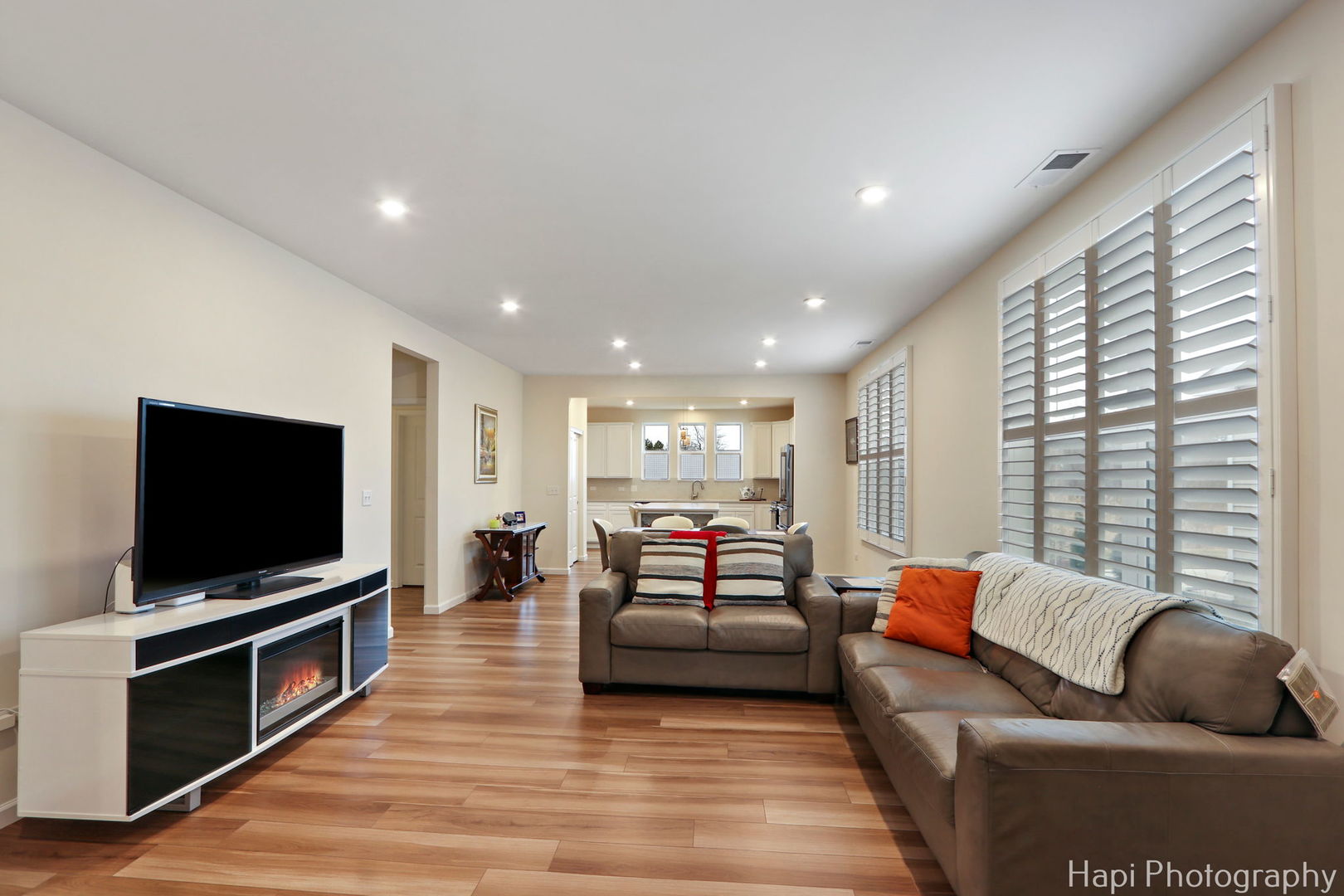 2824 Briargate Drive Lindenhurst, IL 60046 - Photo 3 of 14 a living room with furniture and a flat screen tv