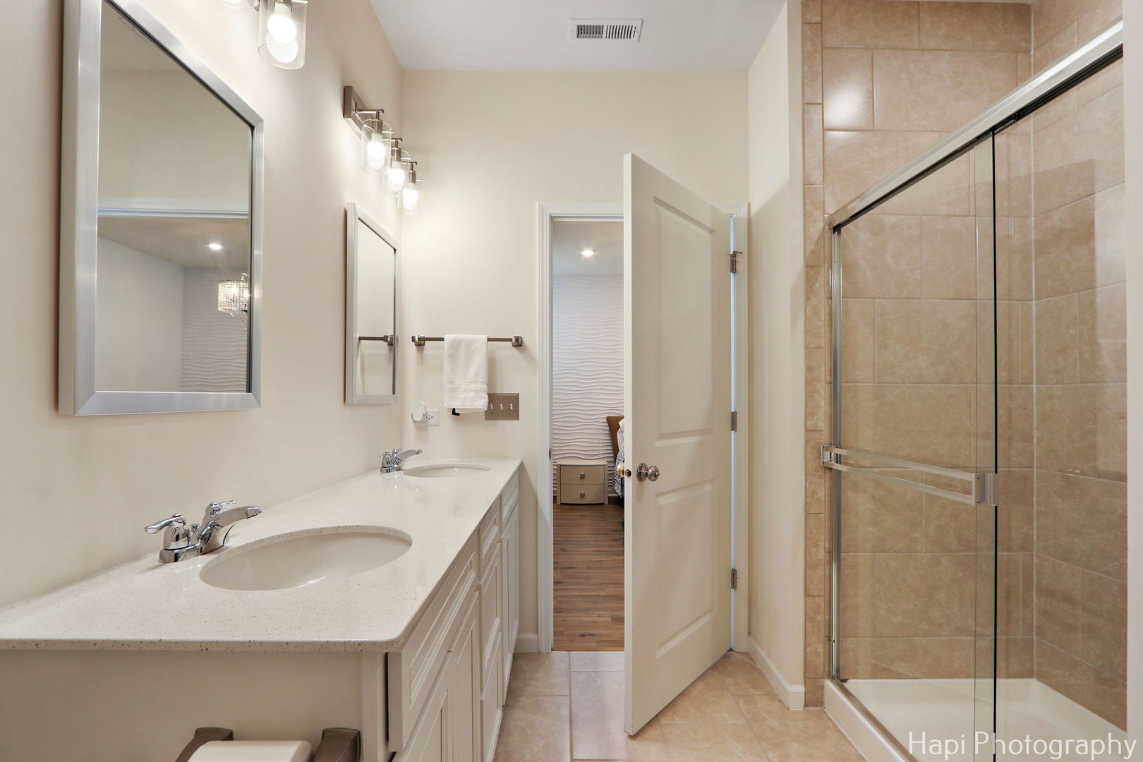 2824 Briargate Drive Lindenhurst, IL 60046 - Photo 9 of 14 a bathroom with a double vanity sink mirror and shower