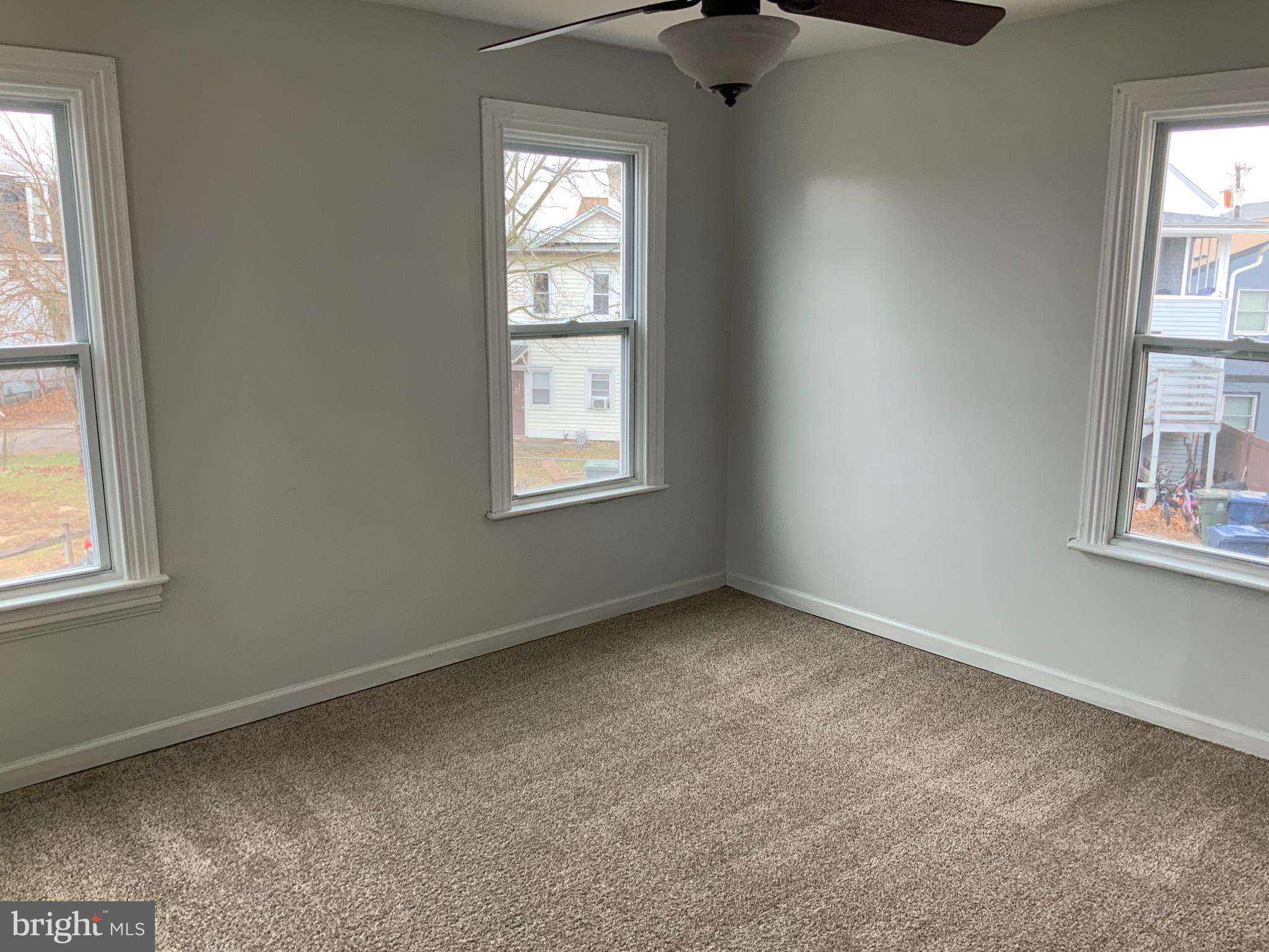 334 Blue Bell Road Williamstown, NJ 08094 - Photo 11 of 18 an empty room with windows