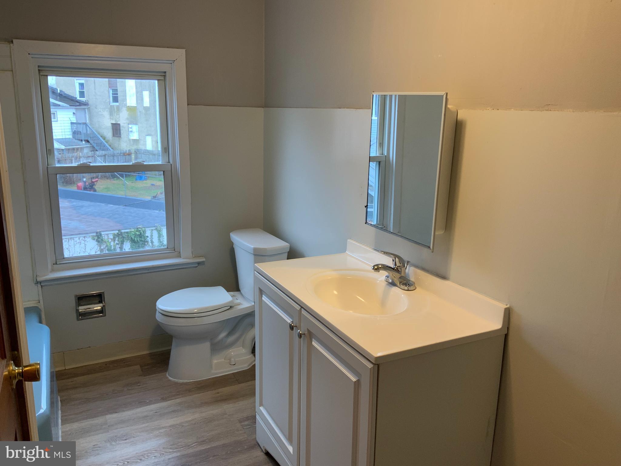 334 Blue Bell Road Williamstown, NJ 08094 - Photo 10 of 18 a bathroom with a sink and a toilet