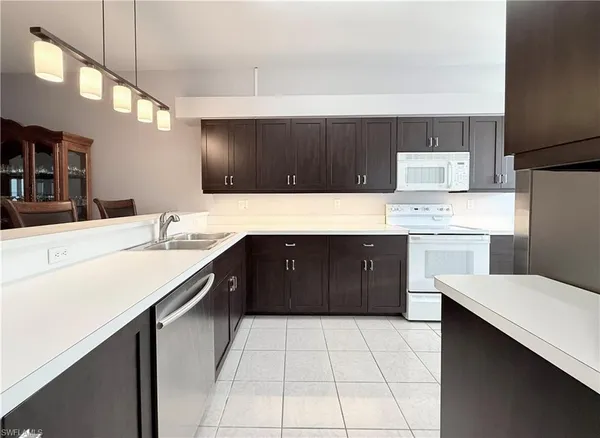 $379,000 | 8555 Naples Heritage Drive, Unit 238, Naples, FL 34112