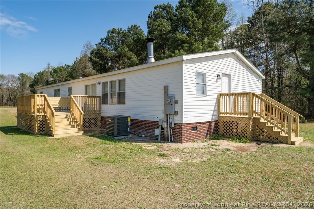 515 Mt Zion Road Red Springs, NC 28377 - Photo 38 of 50 a view of a house with a yard