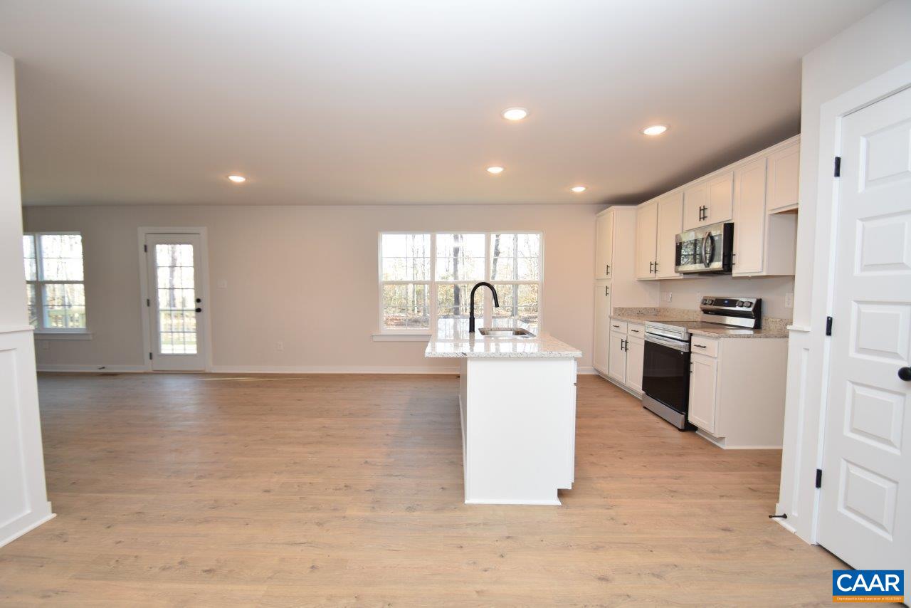 0 Lake Road, Unit HL12A Troy, VA 22974 - Photo 11 of 36 a kitchen with stainless steel appliances a refrigerator sink and stove