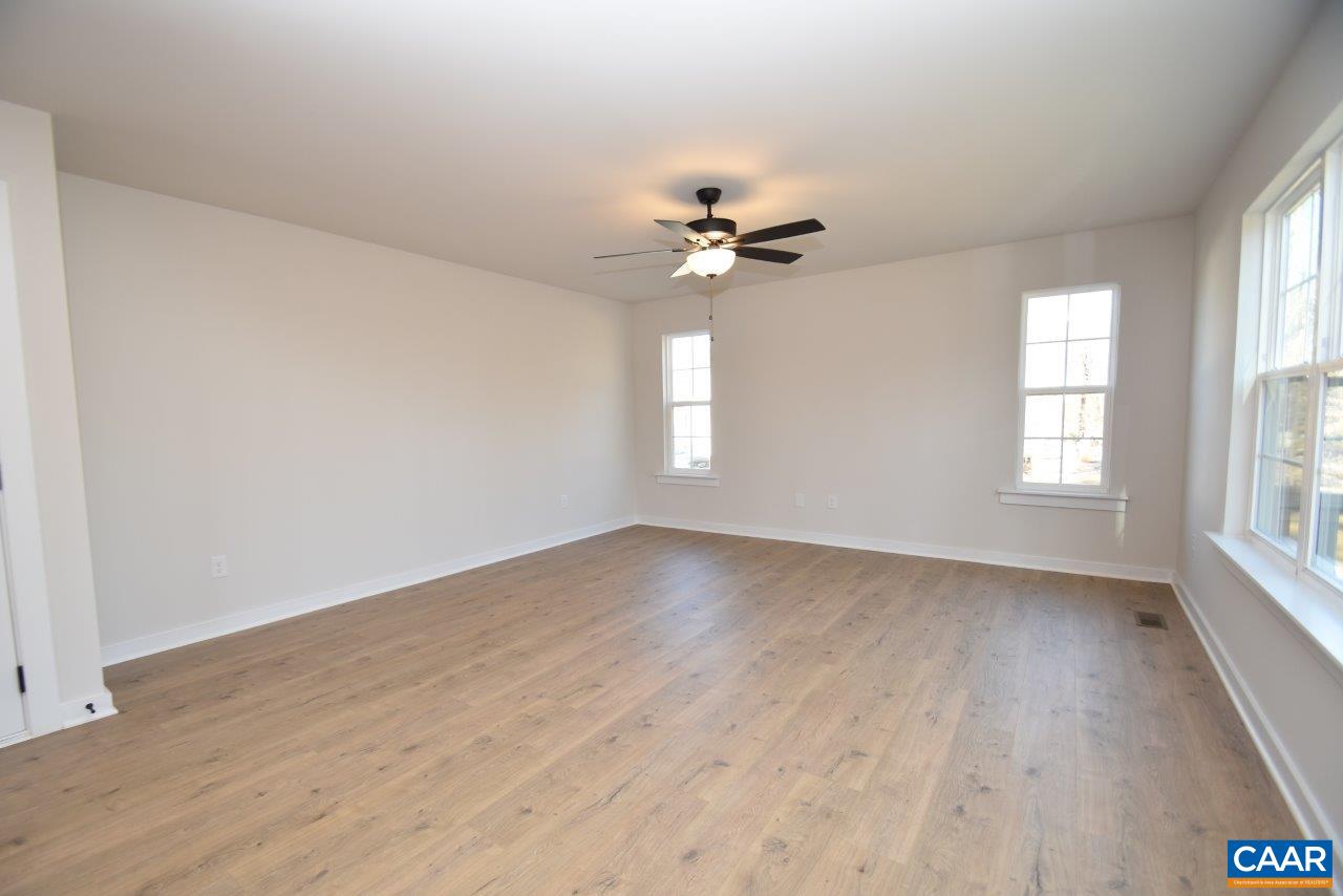 0 Lake Road, Unit HL12A Troy, VA 22974 - Photo 15 of 36 an empty room with wooden floor and windows