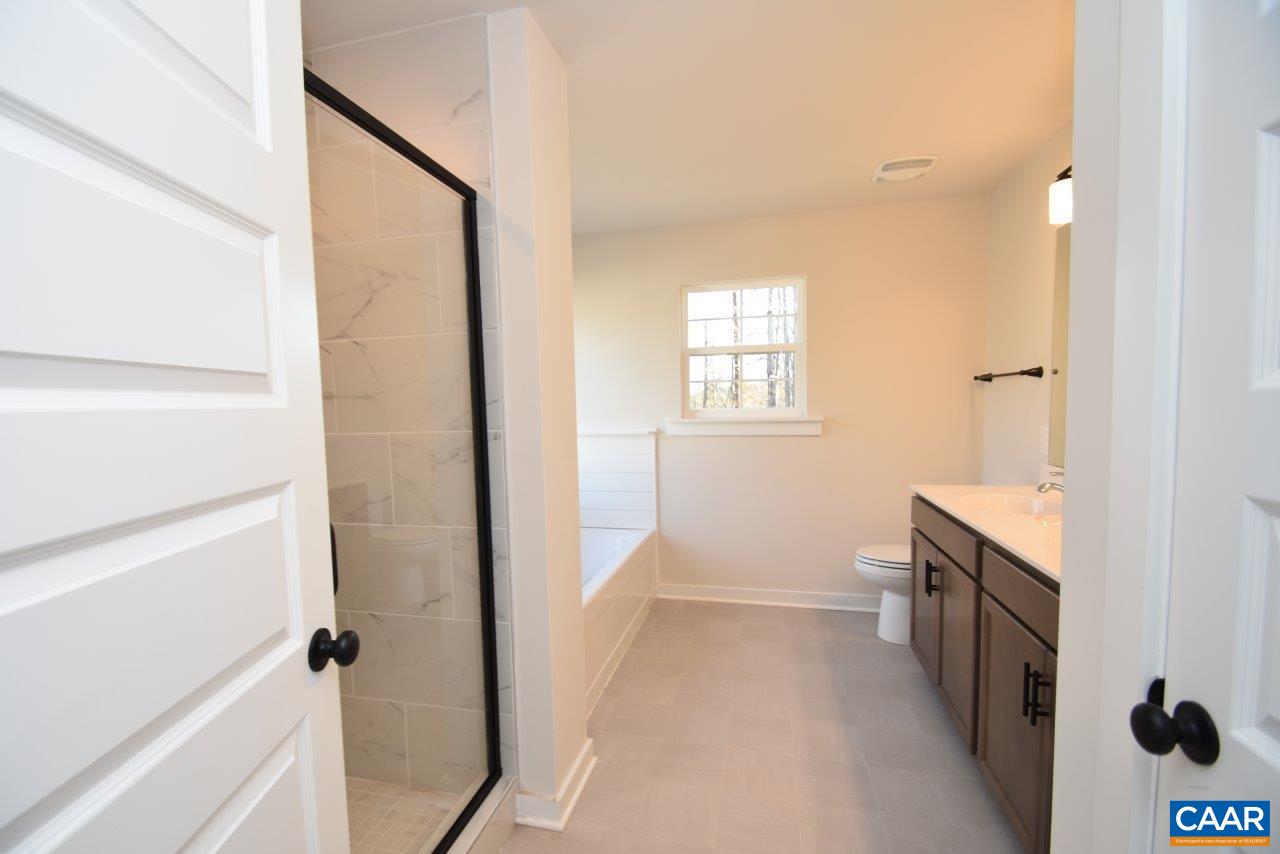 0 Lake Road, Unit HL12A Troy, VA 22974 - Photo 22 of 36 a bathroom with a sink and a toilet